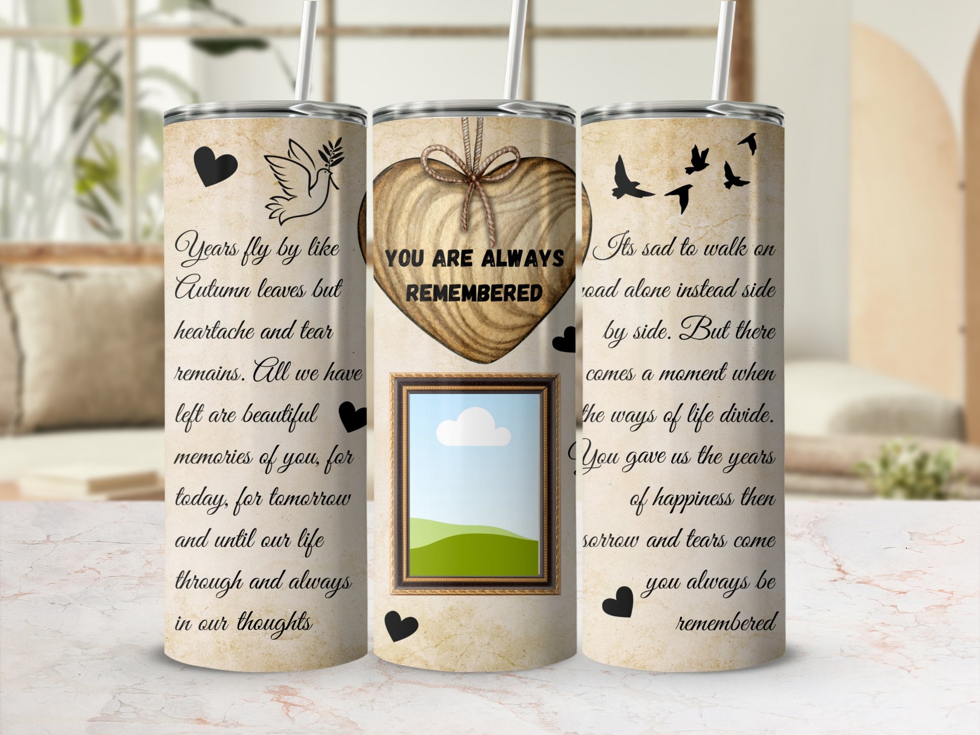 Tumblers with a heart graphic, a dove, and inspirational text.