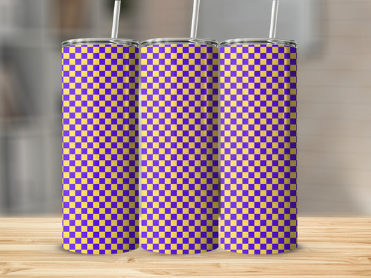 Three tall tumblers with a purple and yellow checkerboard pattern on a wooden surface.