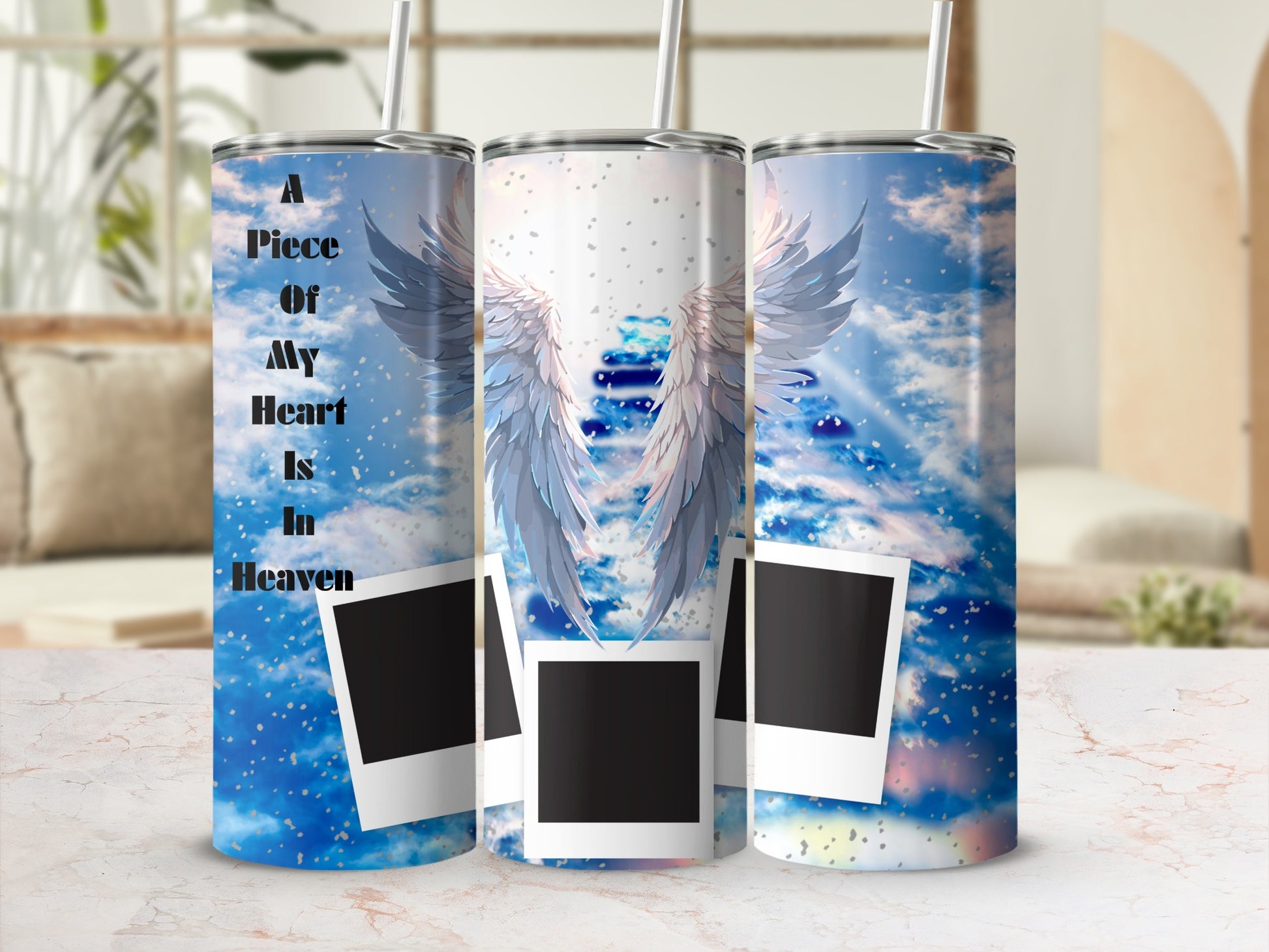 Tumbler with angel wings and text "A Piece Of My Heart Is In Heaven."