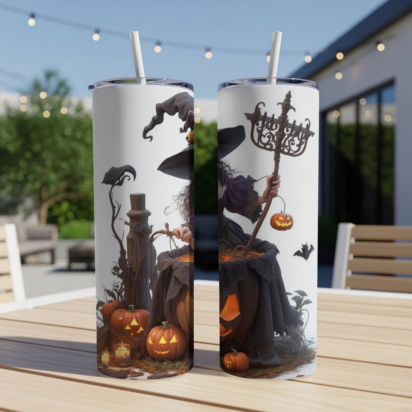 Two tumblers featuring a witch stirring a cauldron with pumpkins and Halloween decorations.