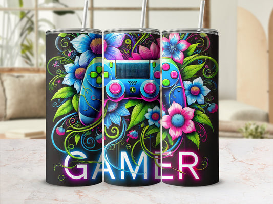 Tumbler featuring a neon video game controller surrounded by colorful flowers and the word "GAMER".