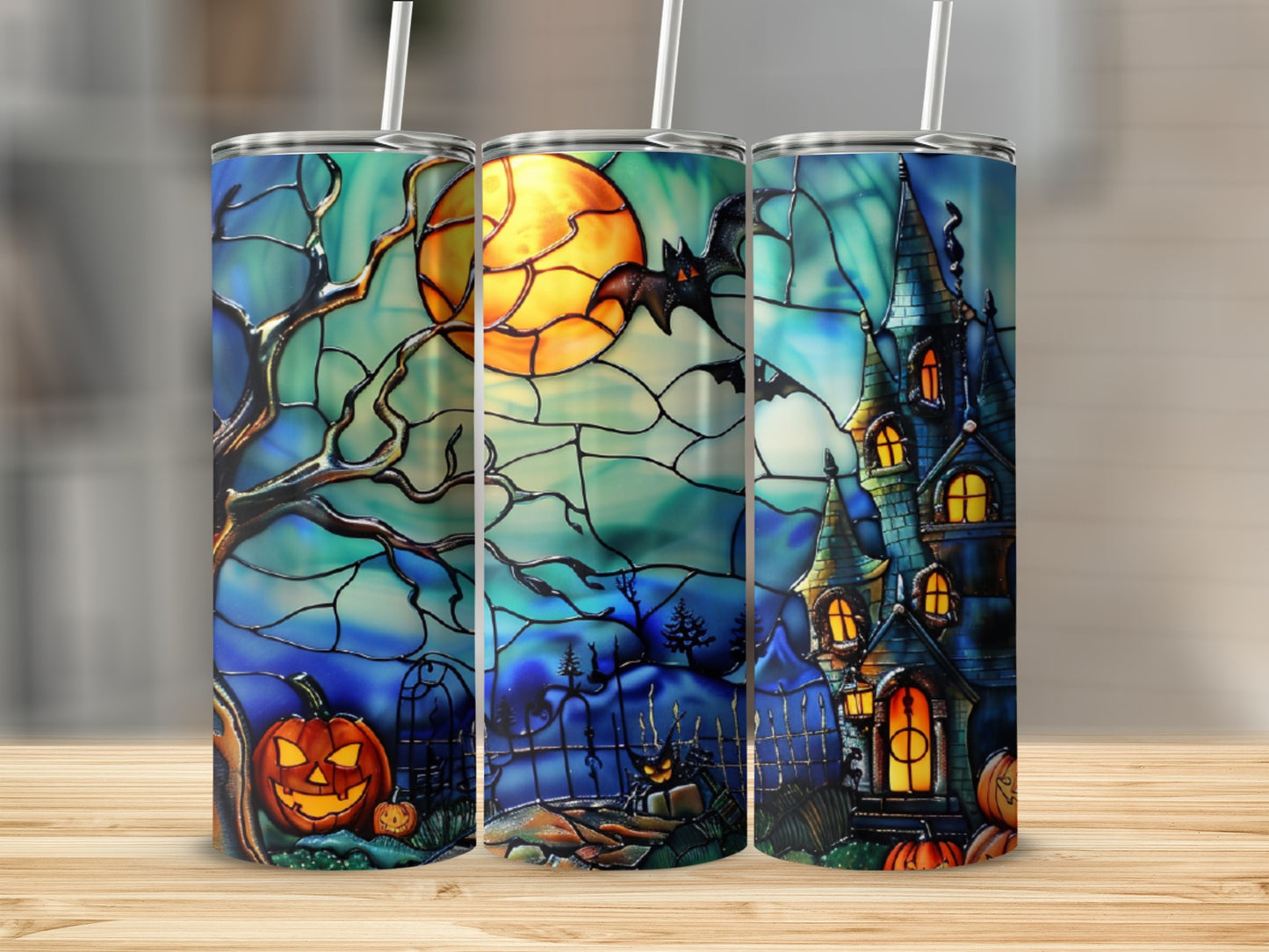 Stained glass tumbler with Halloween scene: haunted house, jack-o'-lanterns, moon, and bat.