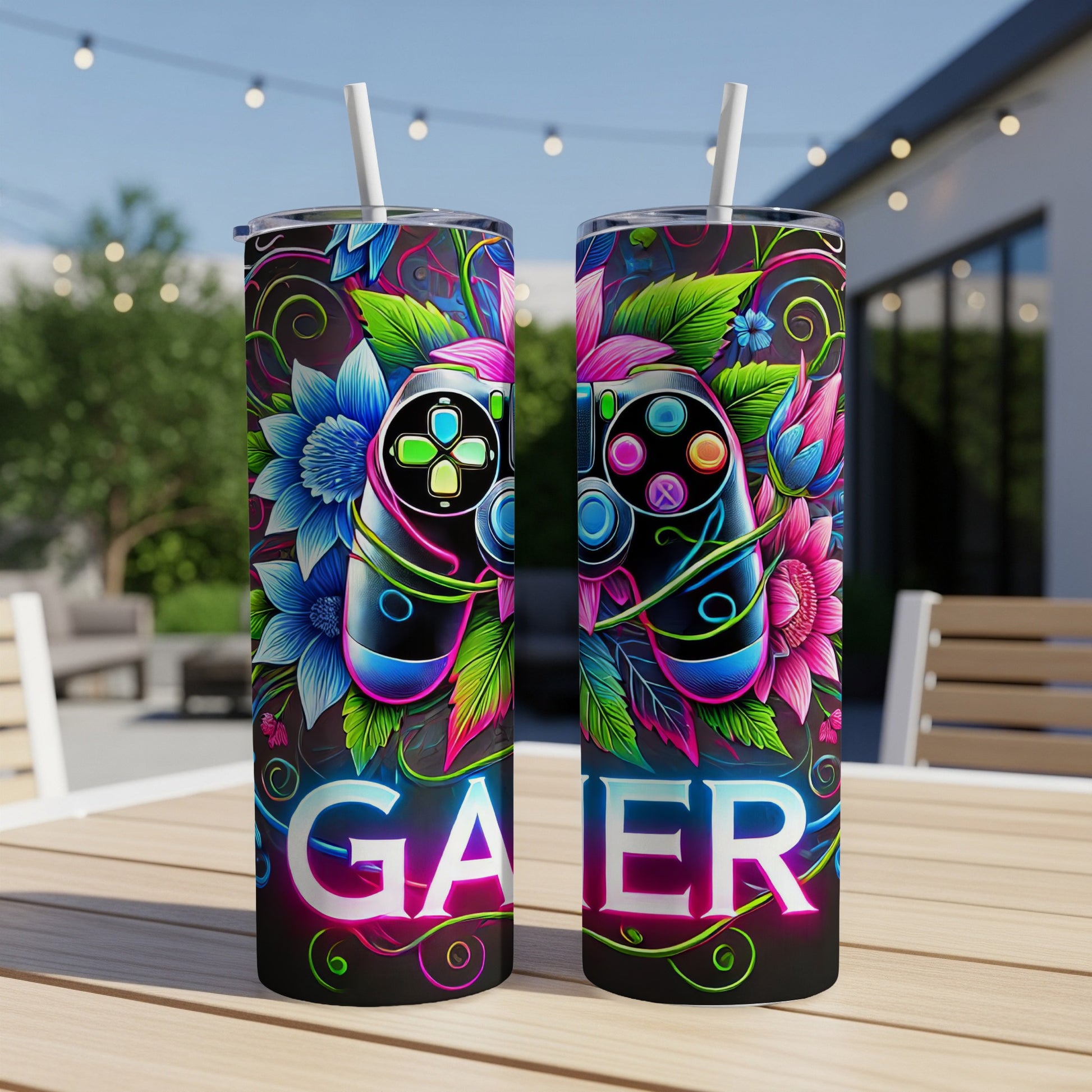 Two tumblers with colorful floral and gaming controller designs.