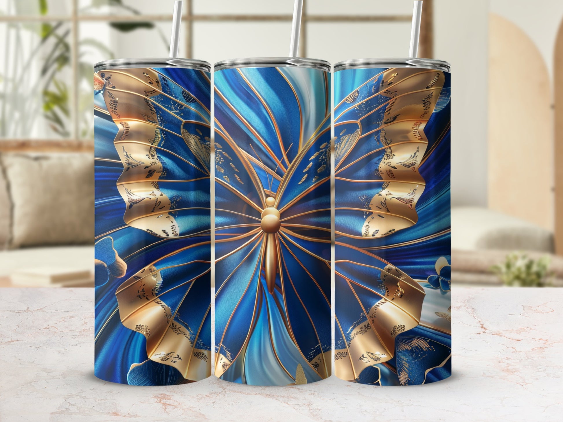Blue and gold patterned tumbler with butterfly design.