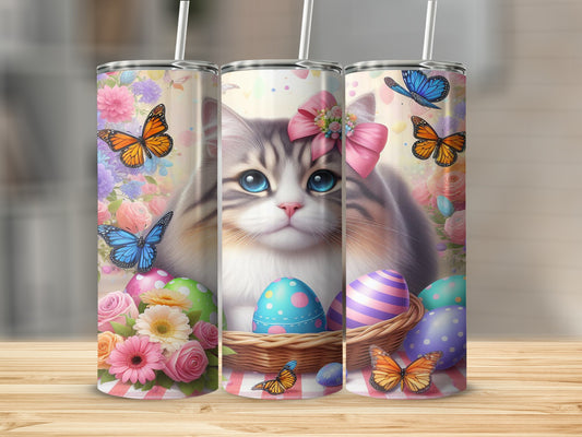 Fluffy cat with butterflies, Easter eggs, and flowers on three tumblers.