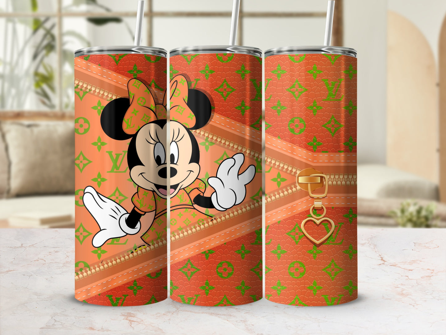 Minnie Mouse on a tumbler with a zipper and heart detail.
