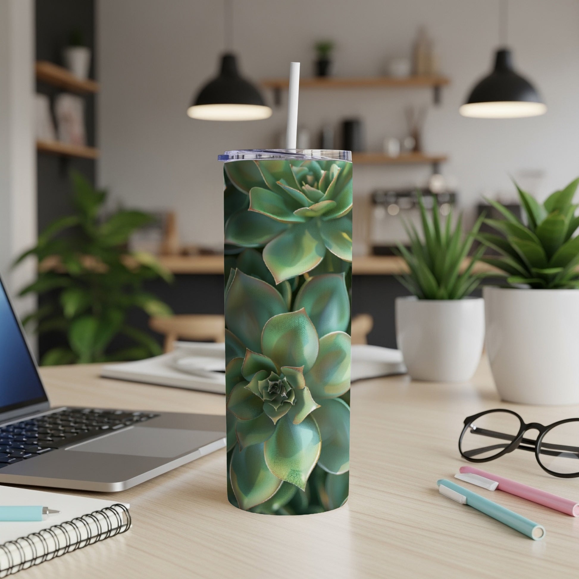 Green succulent plant close-up on a white tumbler with a straw.