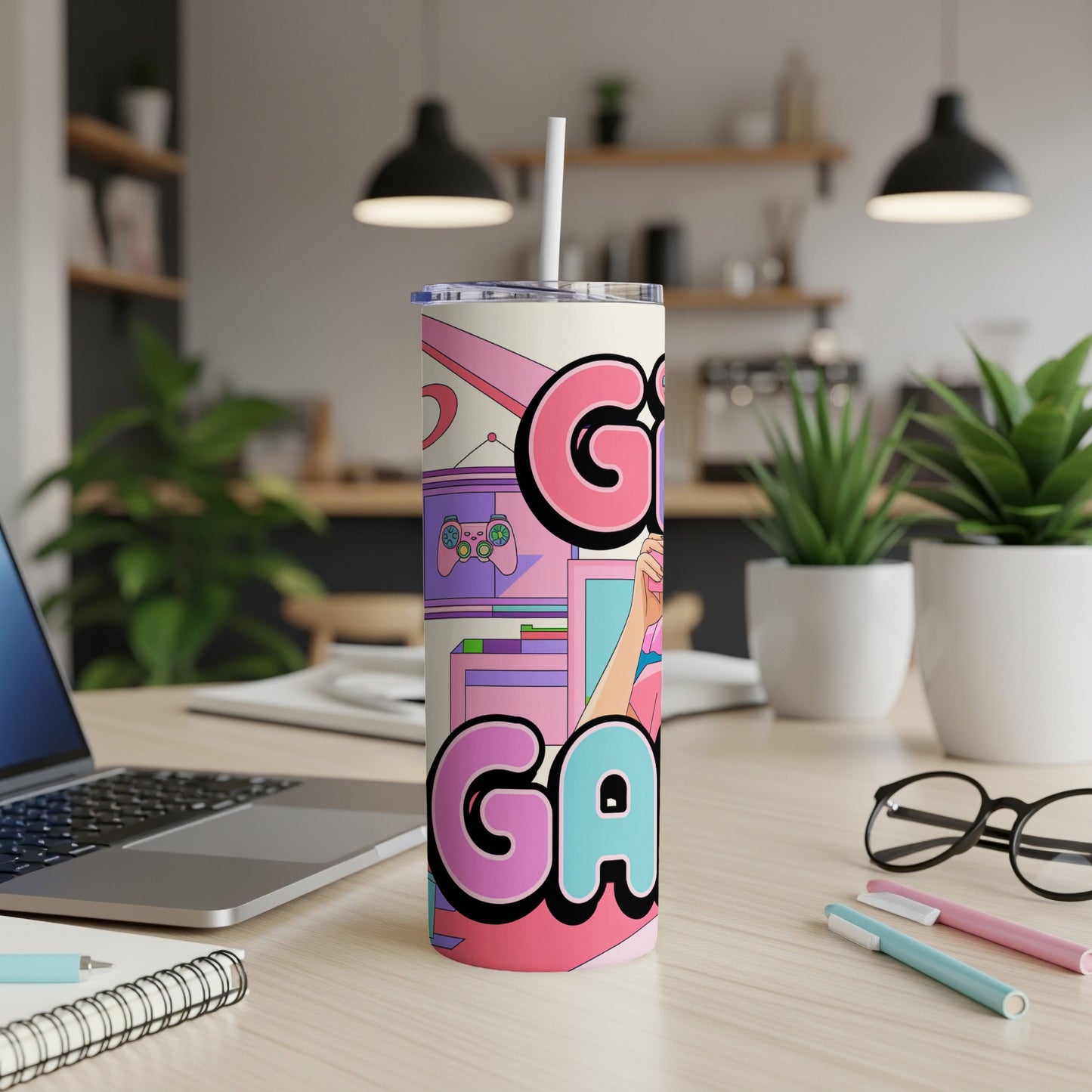 Pink and purple tumbler with "GAMER" text, featuring gaming controllers and console.