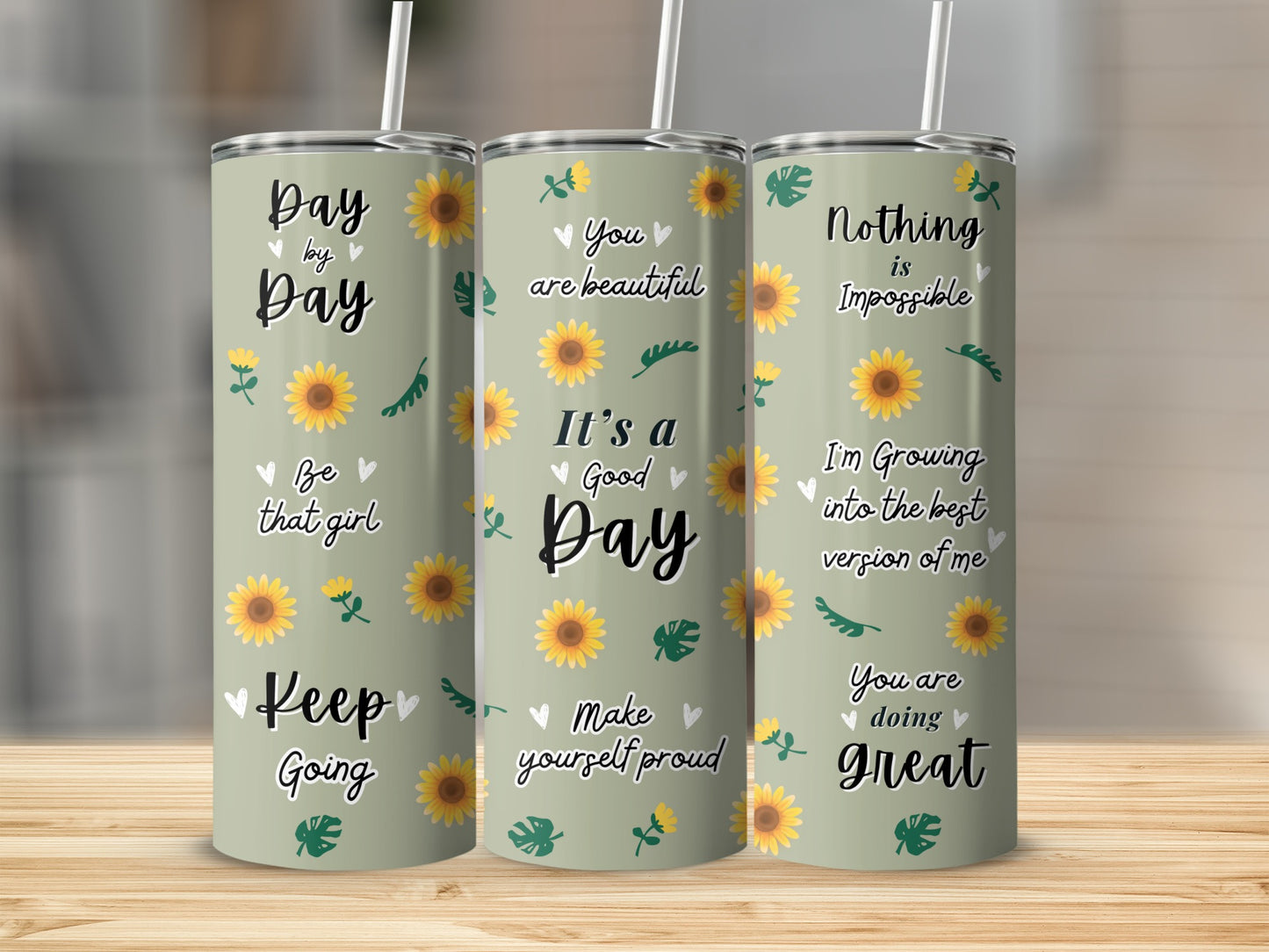 Three tumblers with sunflowers and inspirational text about making it a good day.
