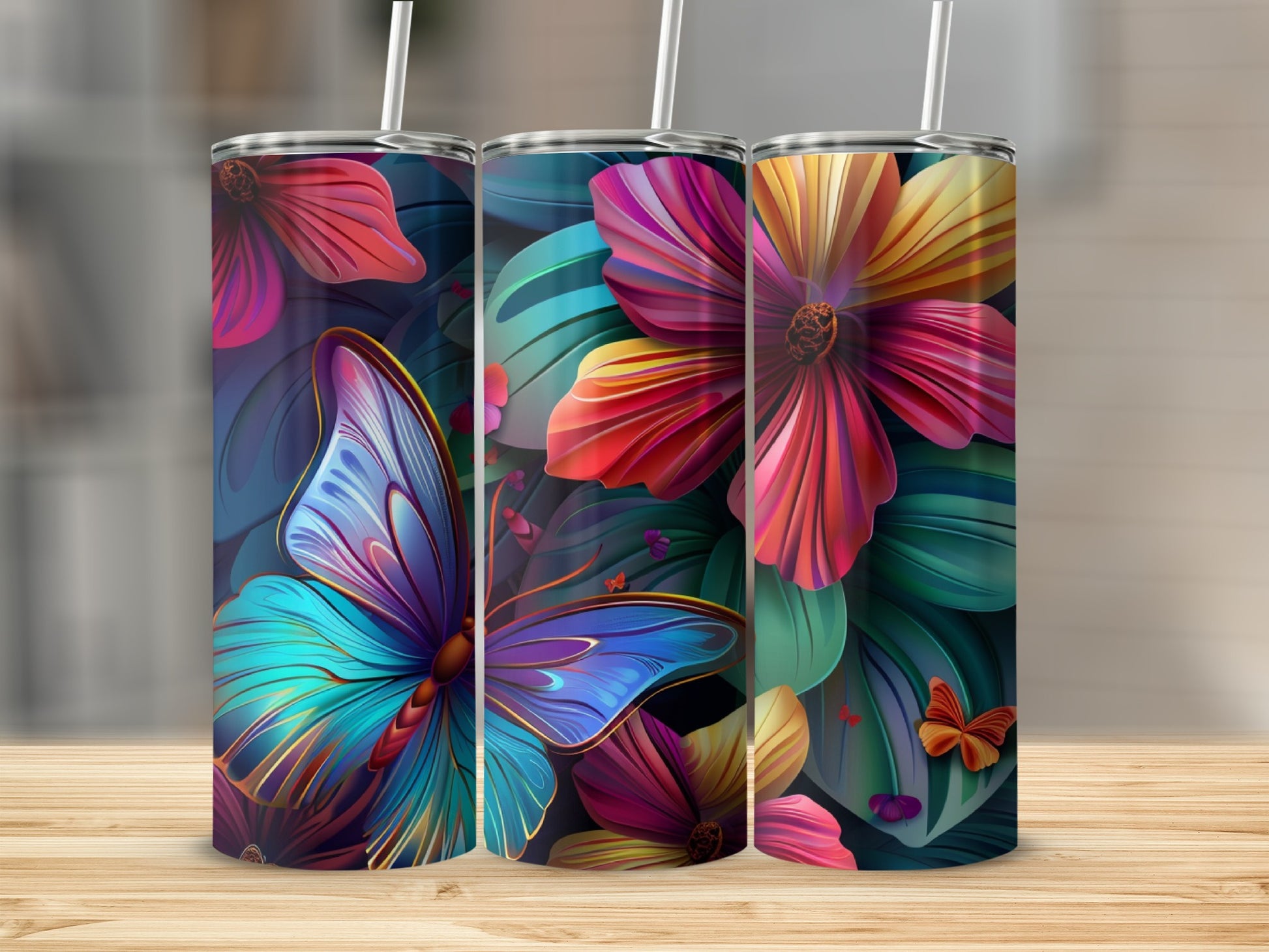 Three tumblers with floral and butterfly designs.
