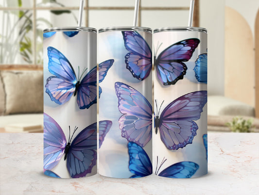 Tumbler with a repeating pattern of blue and purple butterflies.