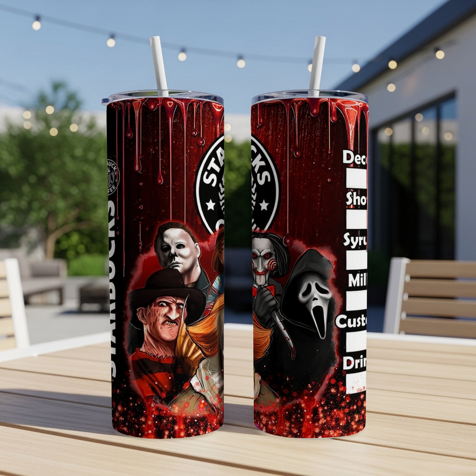 Two tumblers with horror movie characters and dripping blood design.