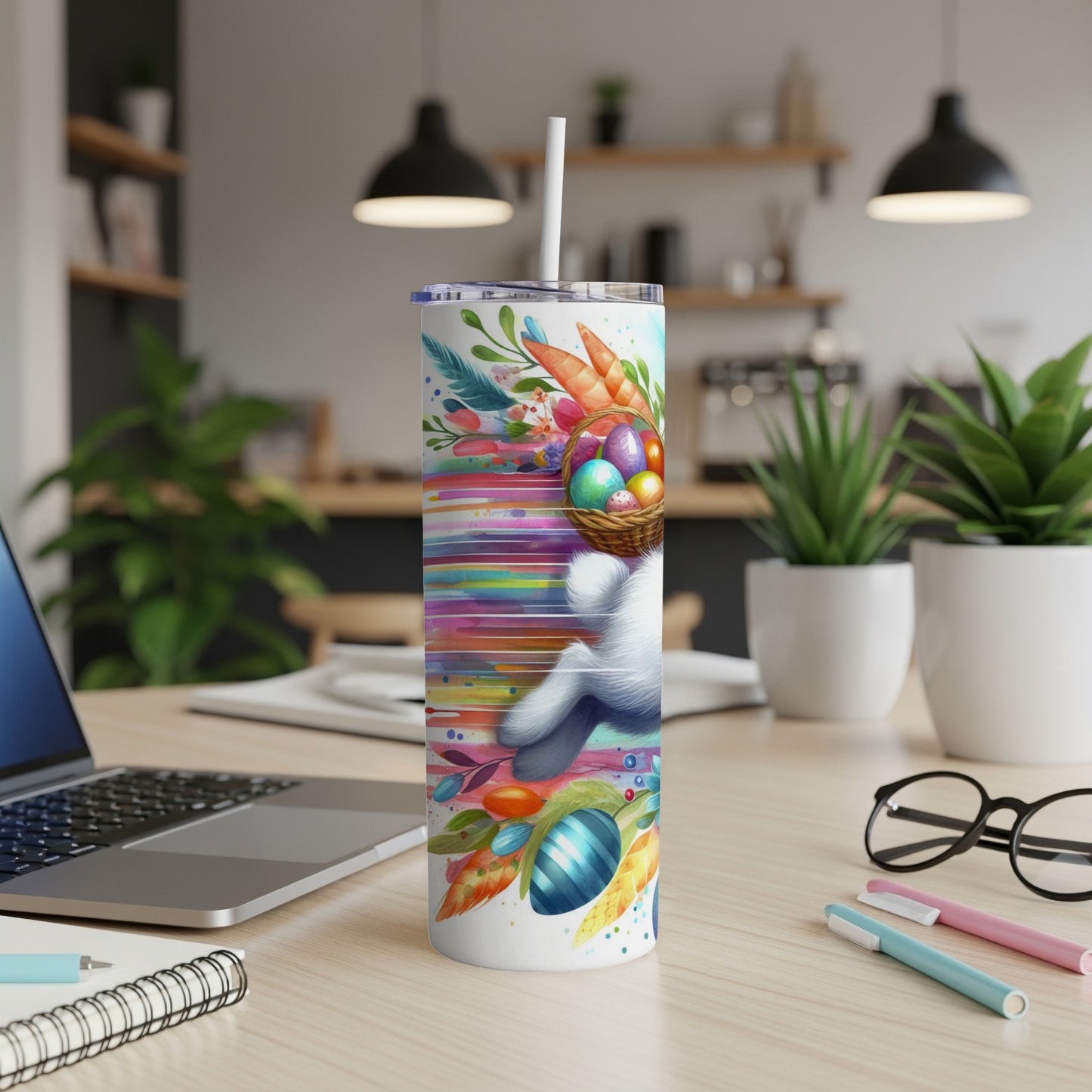 Easter tumbler with colorful eggs, carrots, and a bunny basket.