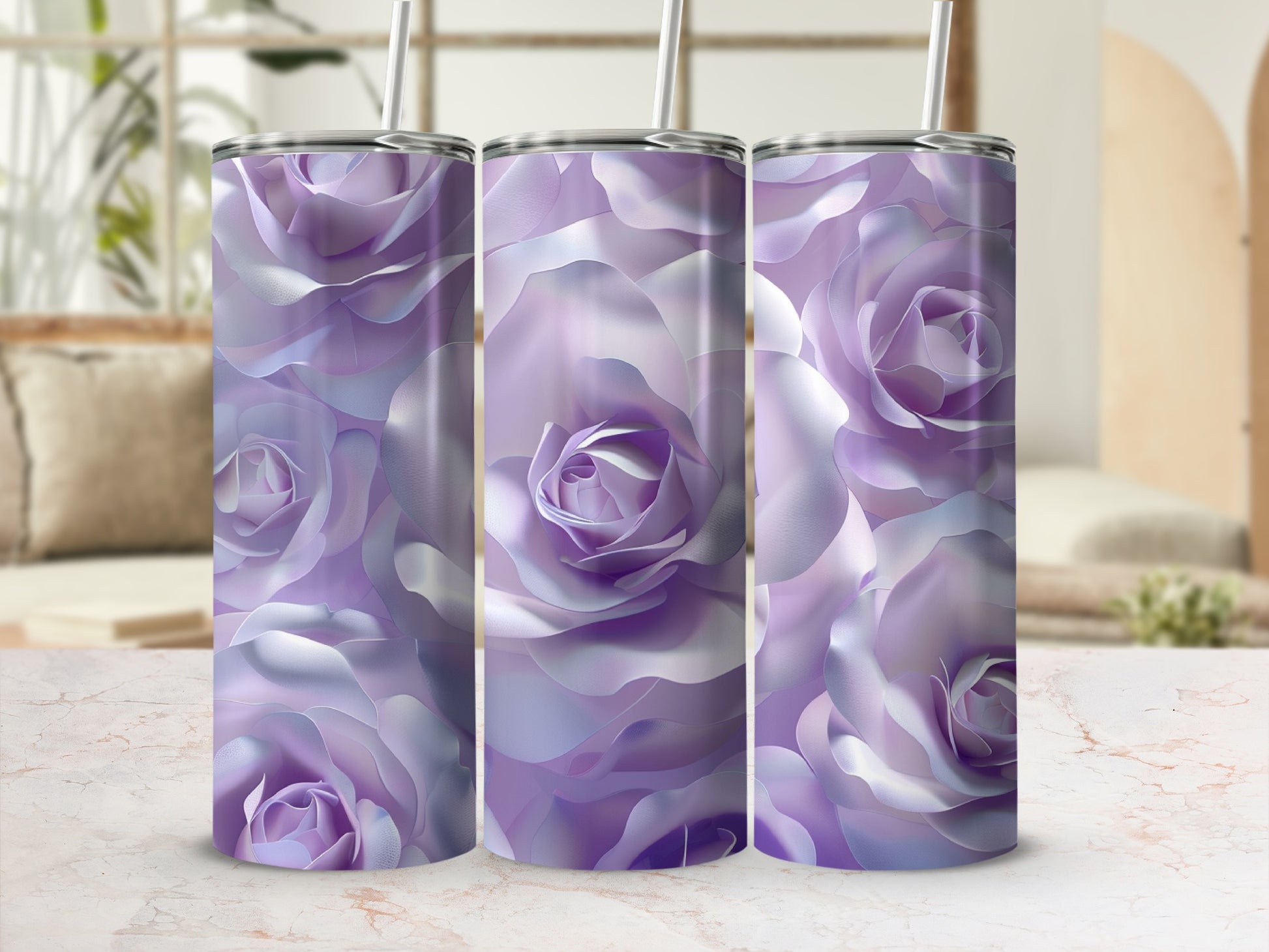 Three tumblers with a soft purple rose pattern on a marbled surface.