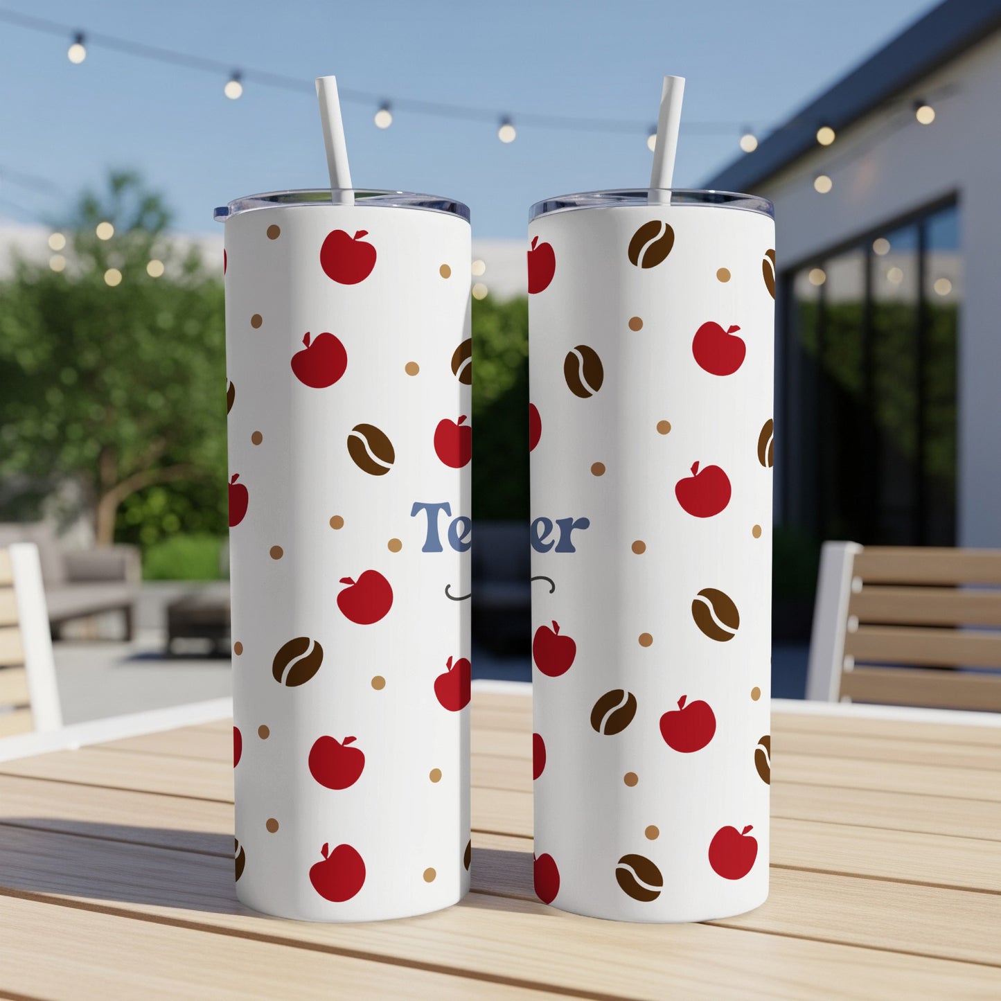 Two white tumblers with red apples and brown coffee beans pattern.