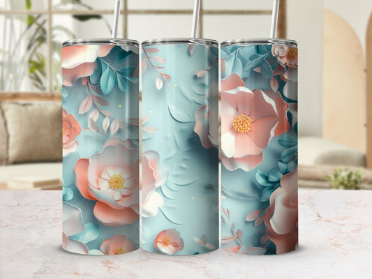 Three tumblers with a soft floral pattern in muted pinks and blues.