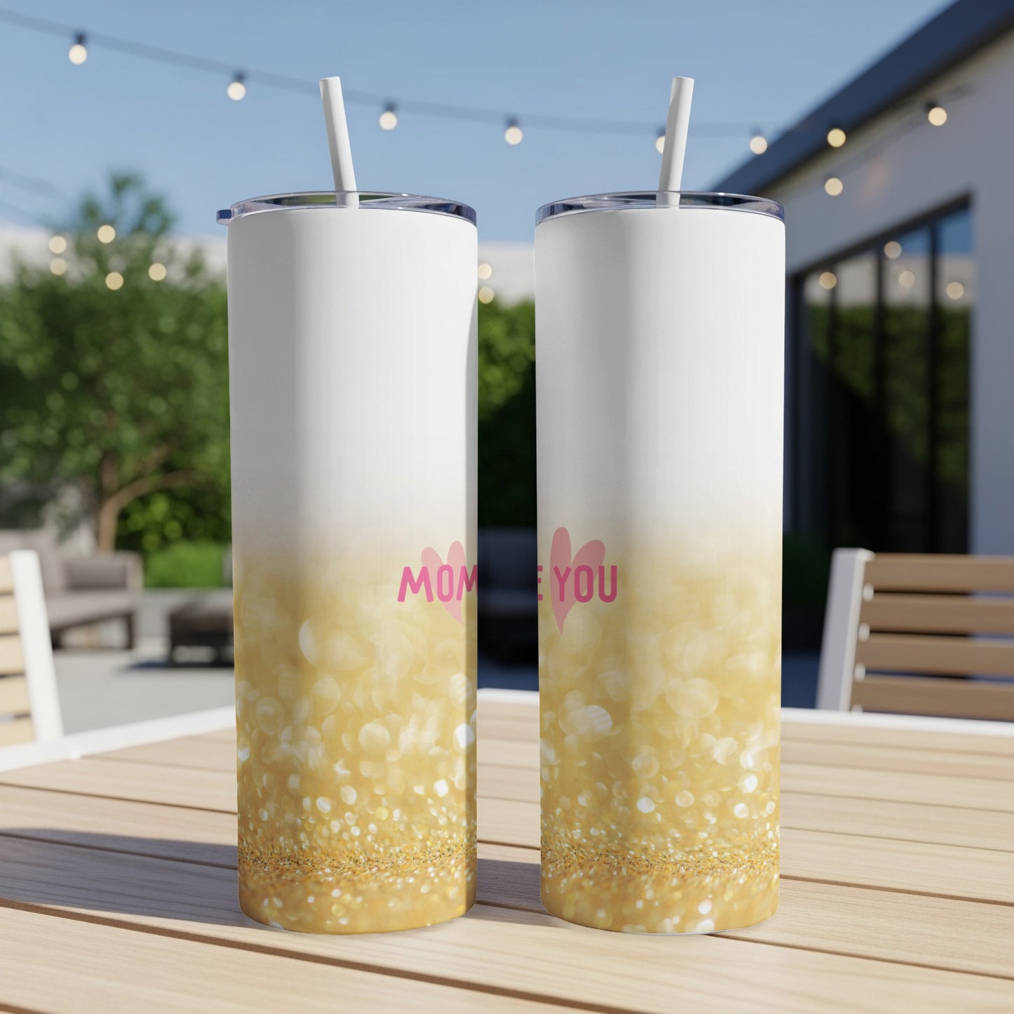Two white tumblers with "Mom I love you" text and gold glitter design.