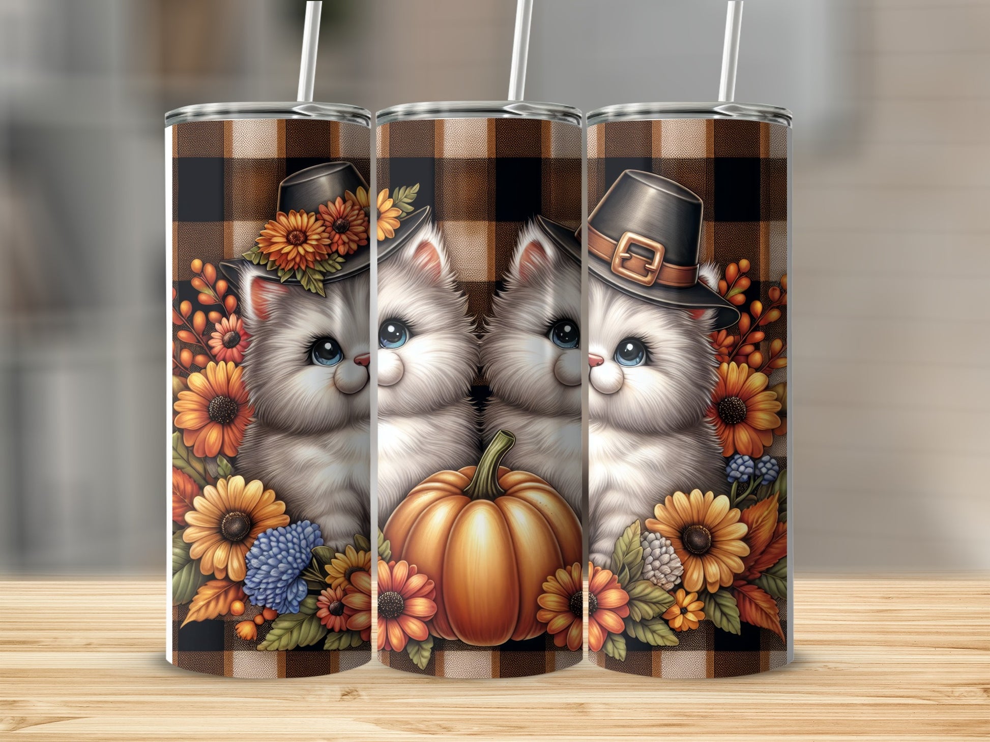 Two white cats in hats with autumn flowers and pumpkin decorations.