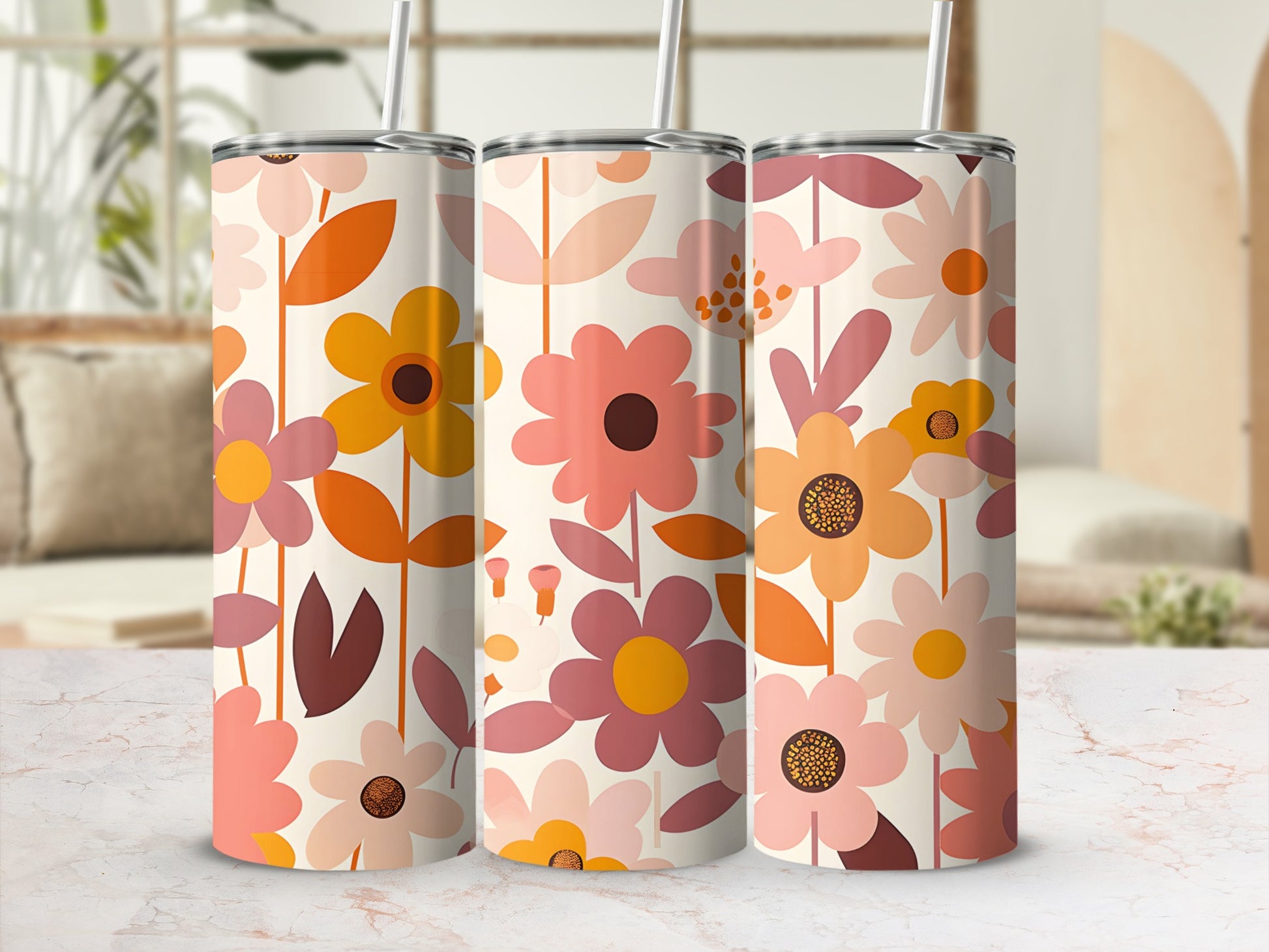 Floral tumbler with warm-toned flowers on a white background.