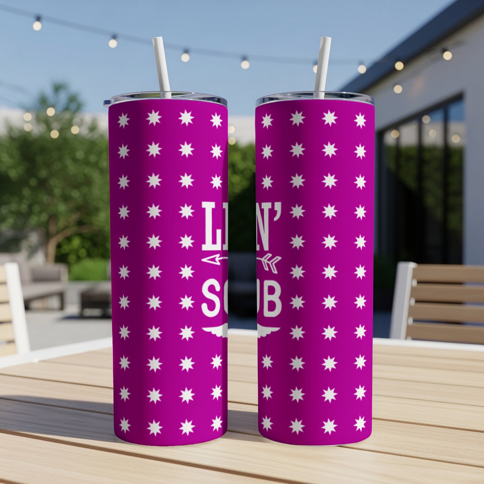 Two tall, pink tumblers with white star pattern and "Livin' the good life" text.