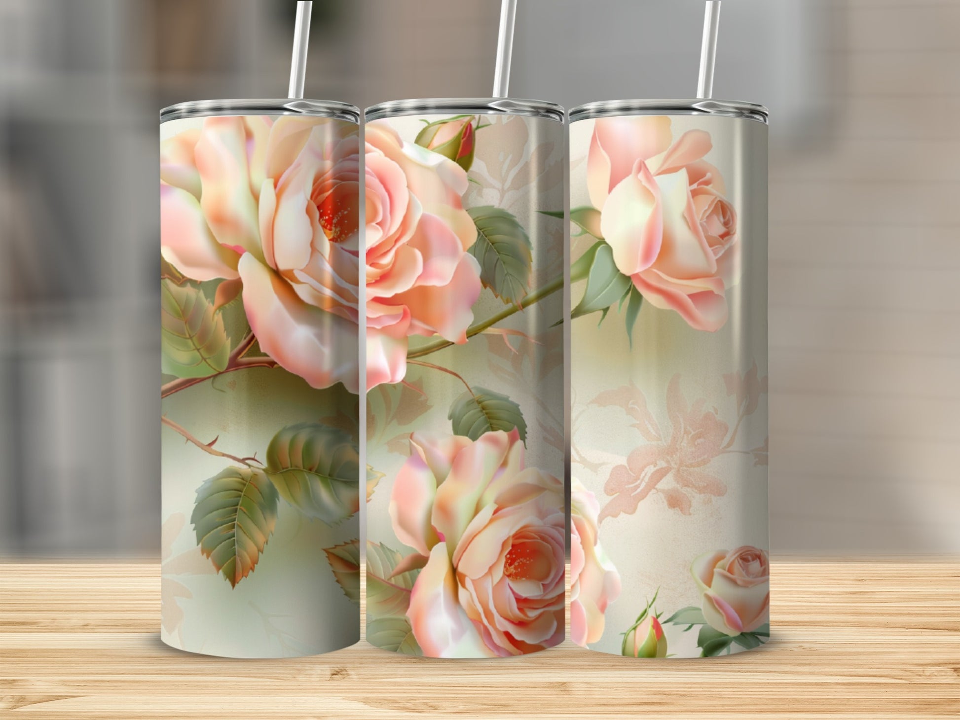 Three tumblers with pale pink roses and green leaves.