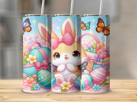 Easter bunny with butterfly and egg decorations on a tumbler.