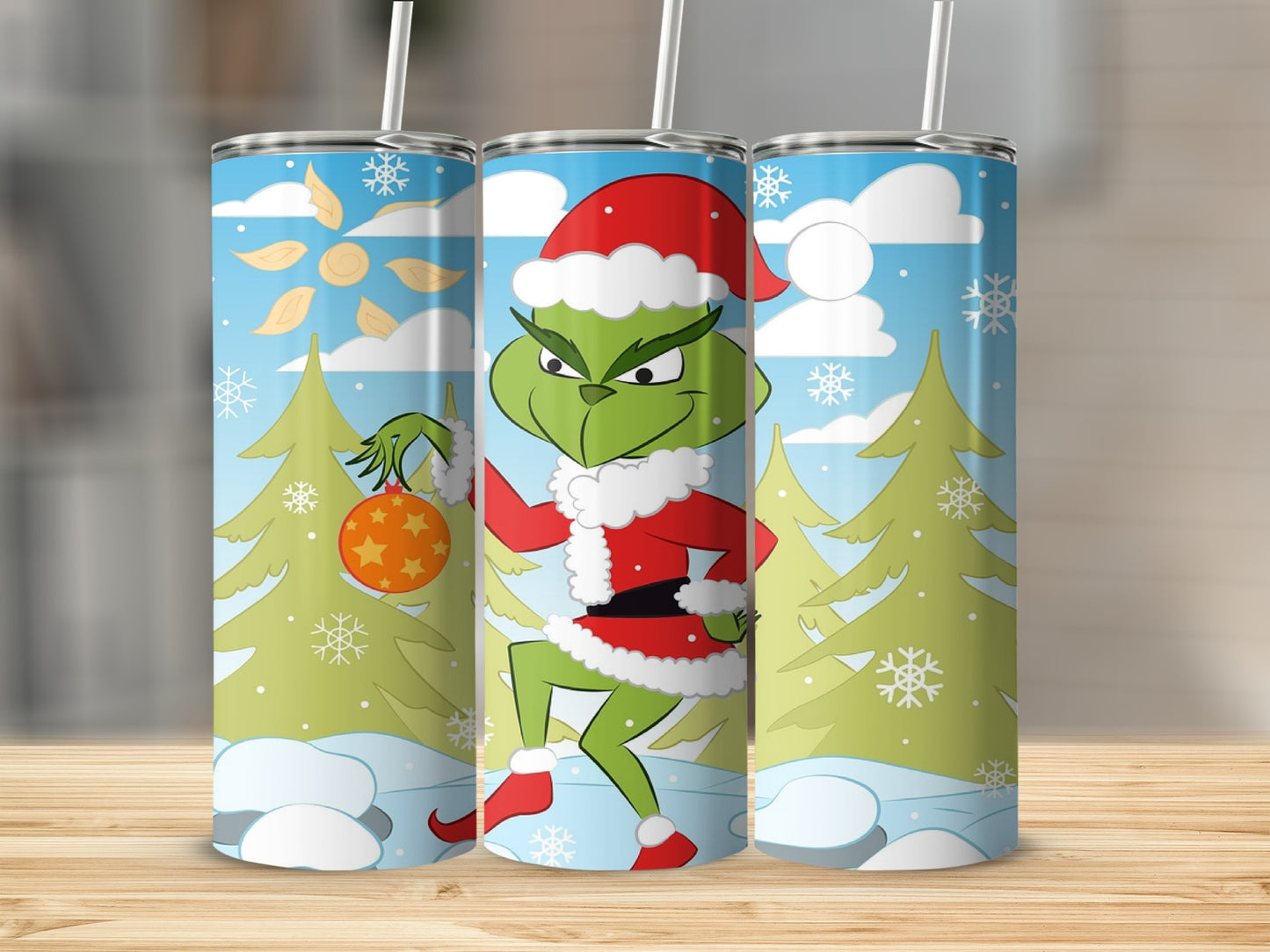 The Grinch in a Santa hat holding an ornament, with snow and trees.