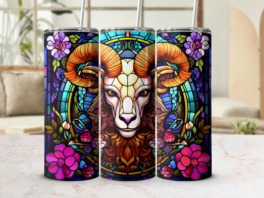 Stained glass ram with colorful flowers on a tumbler.