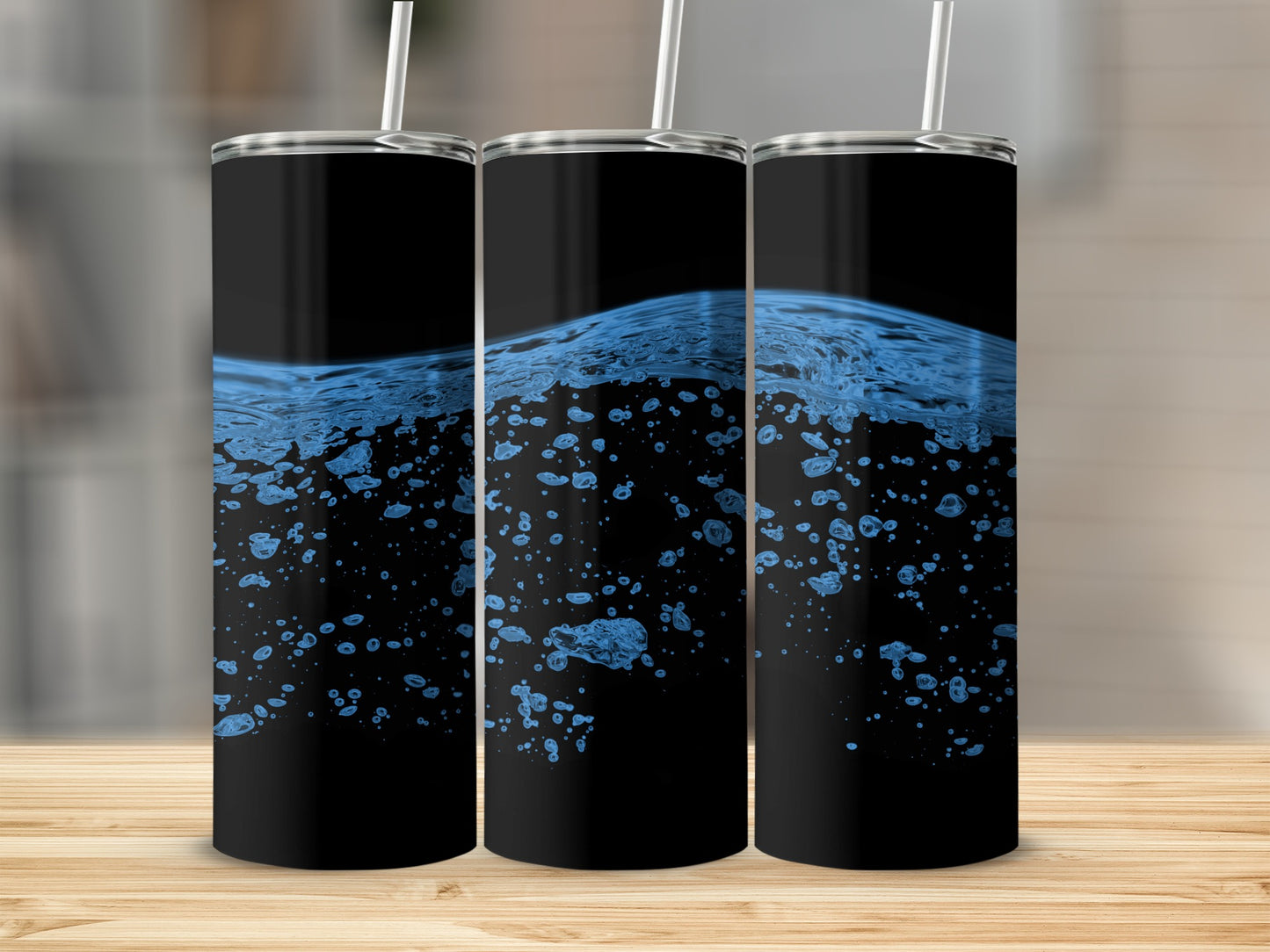 Black tumbler with blue water and bubbles design.