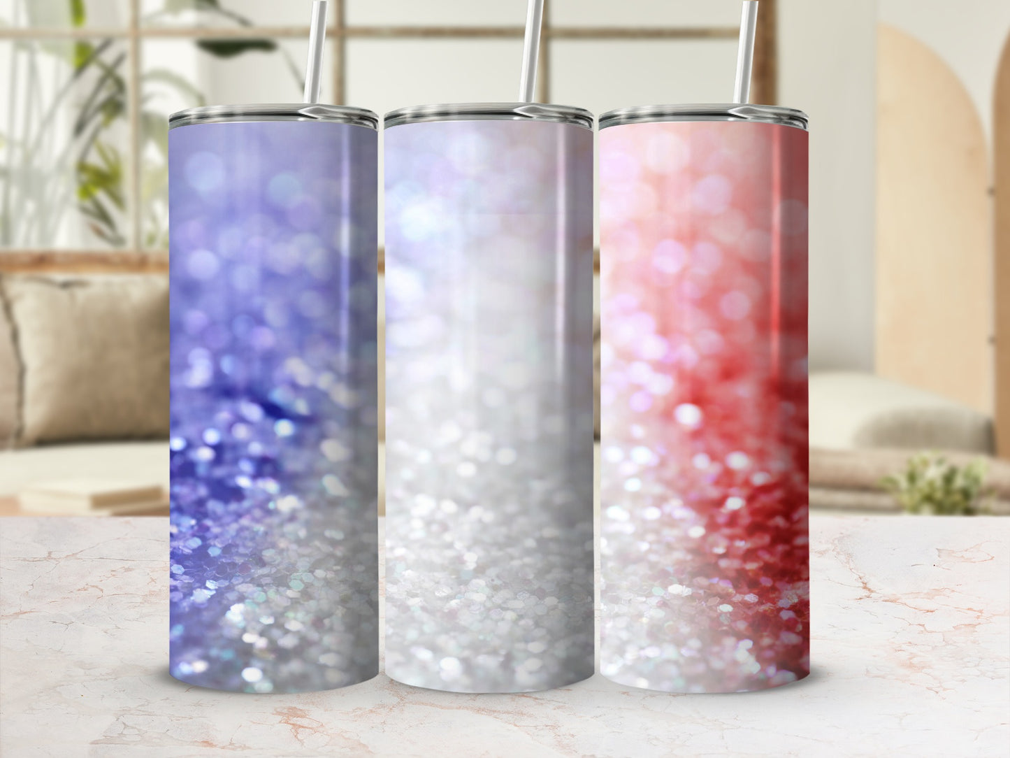 Three glitter tumblers with purple, white, and red ombre patterns.