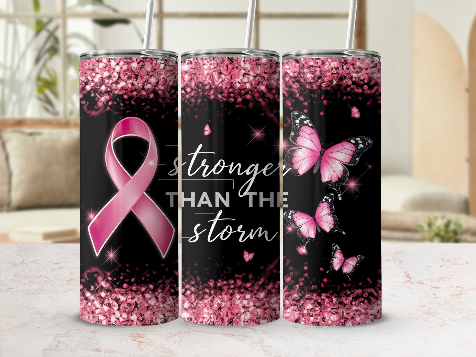 Black tumbler with pink glitter and butterflies, "Stronger Than The Storm" text.