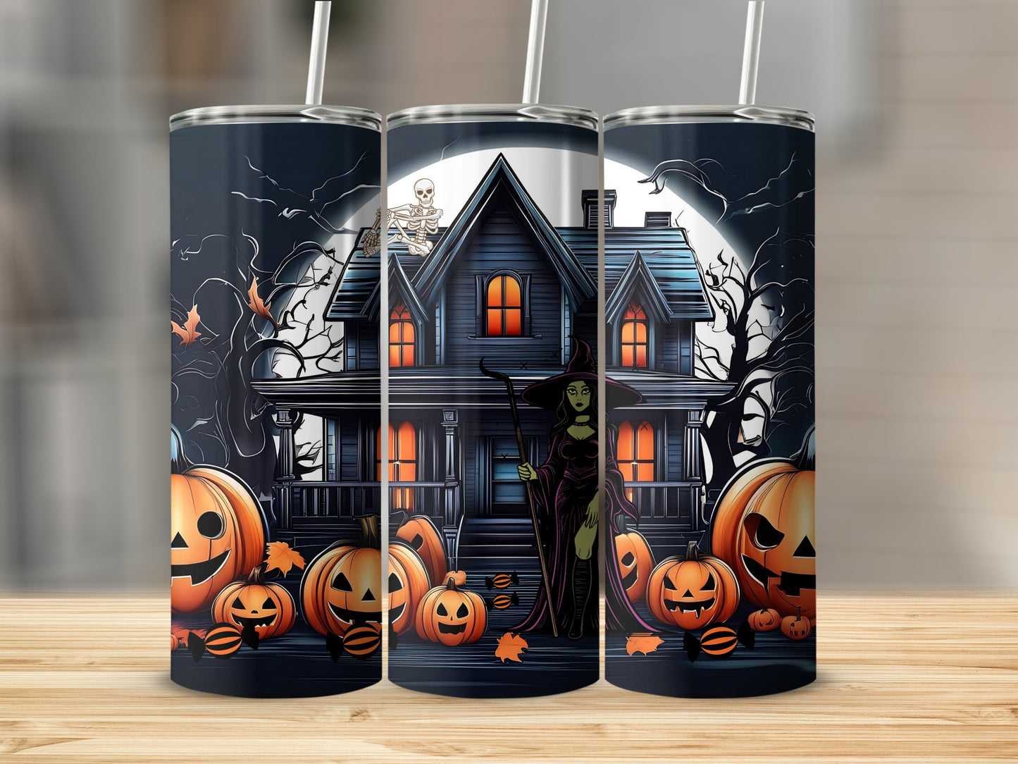 Halloween tumbler with witch, haunted house, pumpkins, bats, and skeleton.