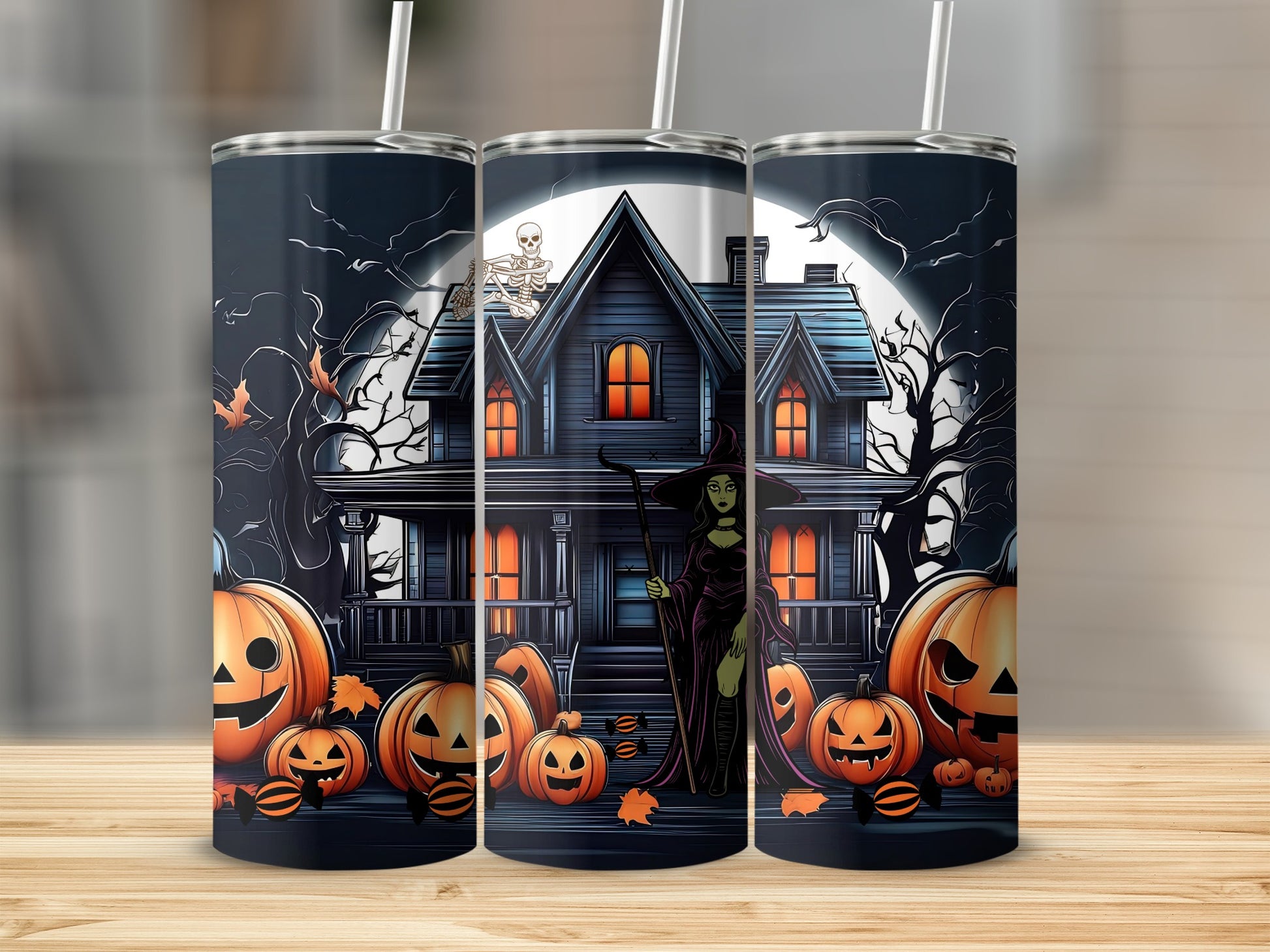 Halloween tumbler with witch, haunted house, pumpkins, bats, and skeleton.