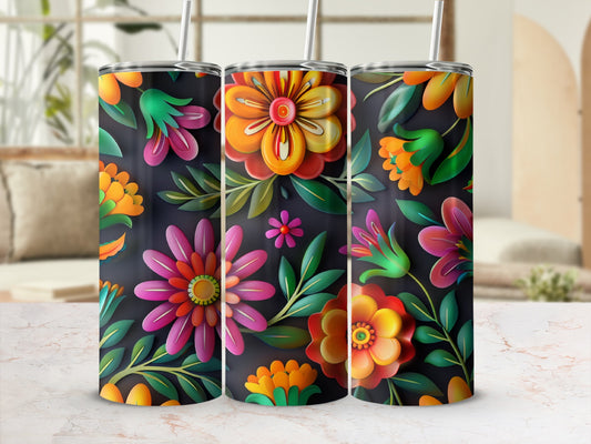 Floral tumbler with colorful flowers on dark background.