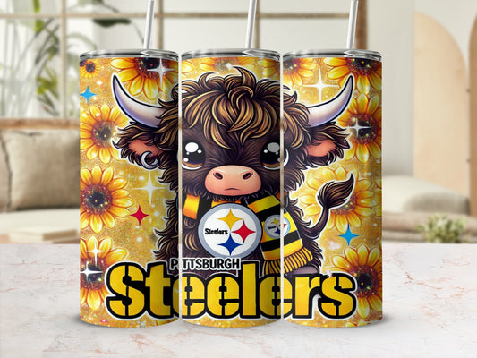 Cute highland cow wearing a Pittsburgh Steelers scarf and bandana.