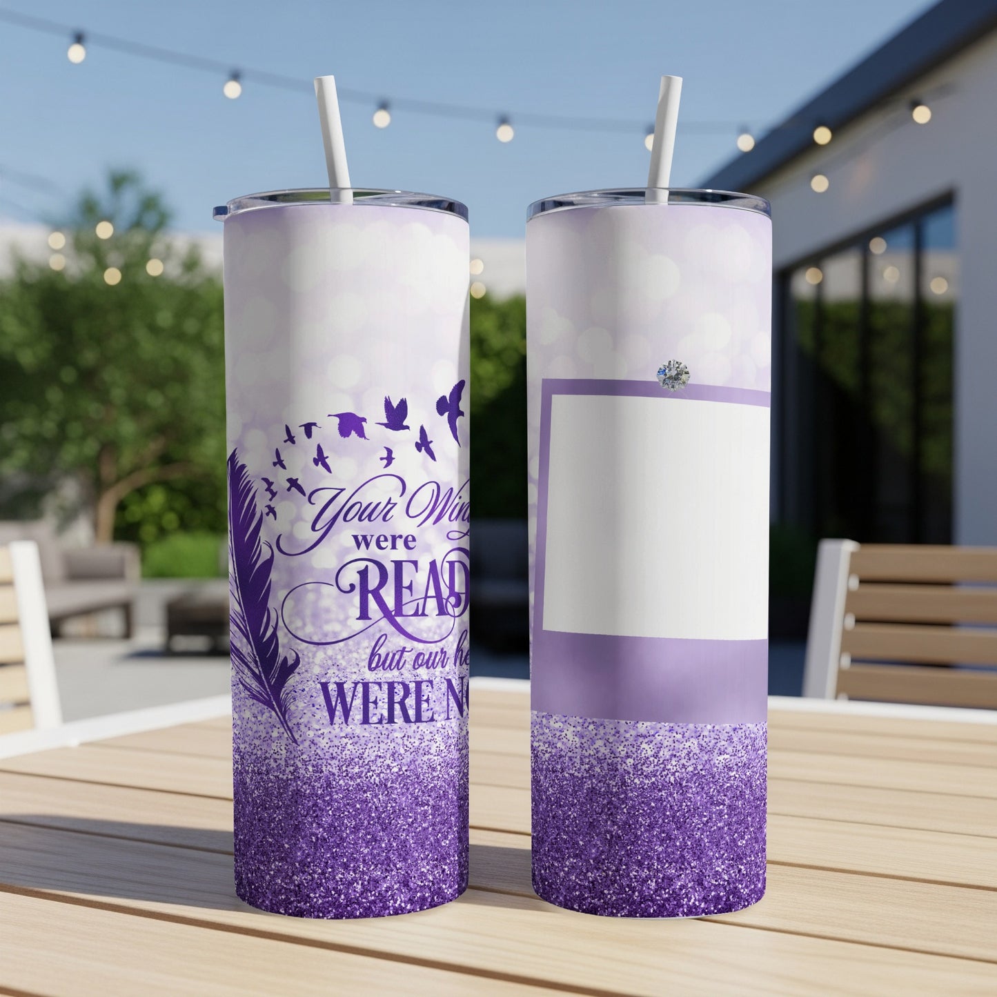 Two purple glitter tumblers with birds and memorial text reading "Your wings were ready but our hearts weren't".