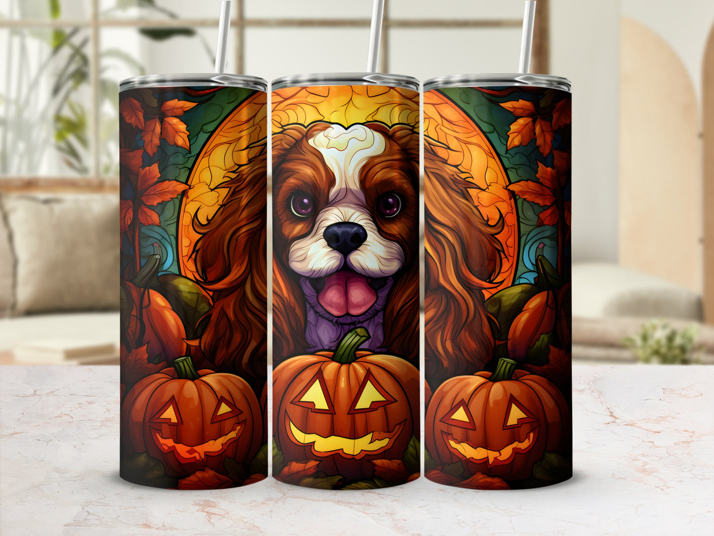 Three tumblers with a Cavalier King Charles Spaniel and jack-o'-lantern Halloween design.