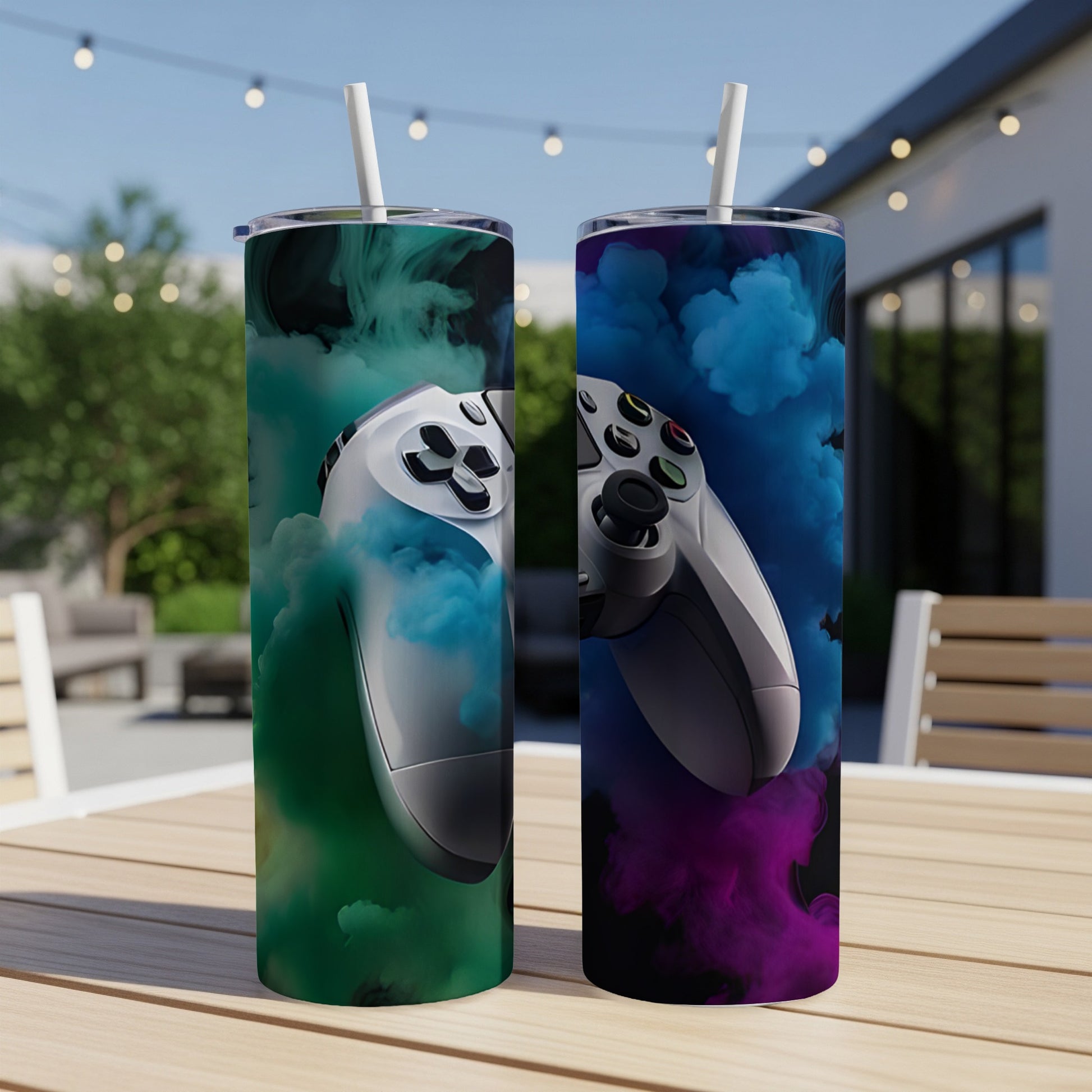 Two tumblers with gaming controllers and colorful smoke designs.