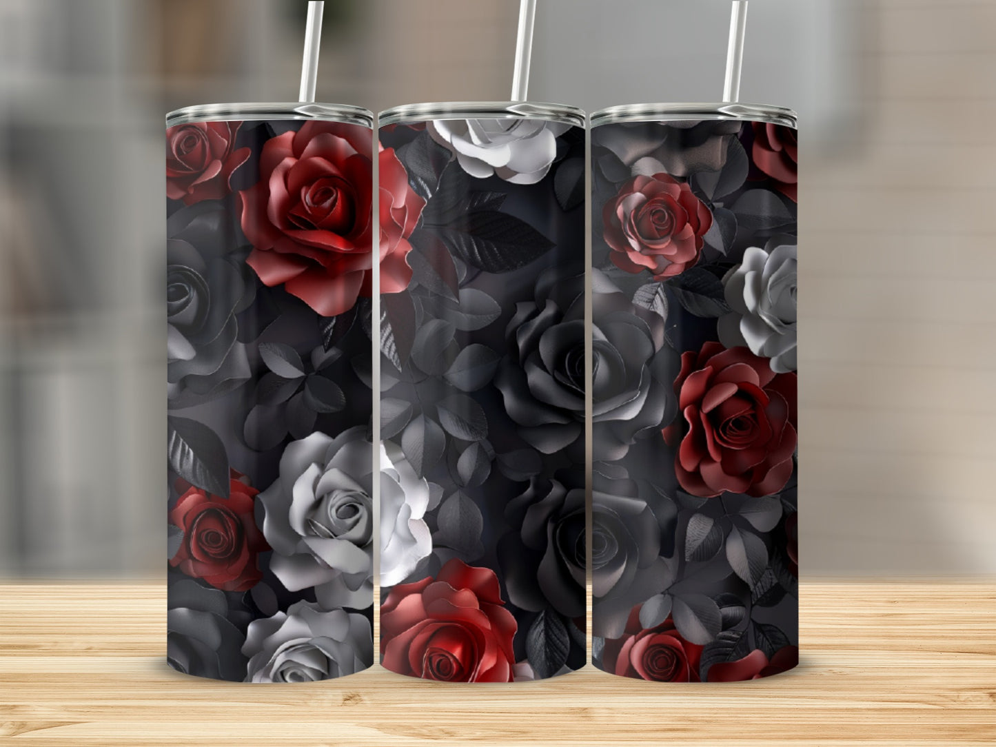 Three tumblers with red, white, and grey roses on a dark floral background.