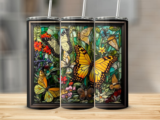 Three tumblers featuring colorful stained-glass butterflies and flowers.
