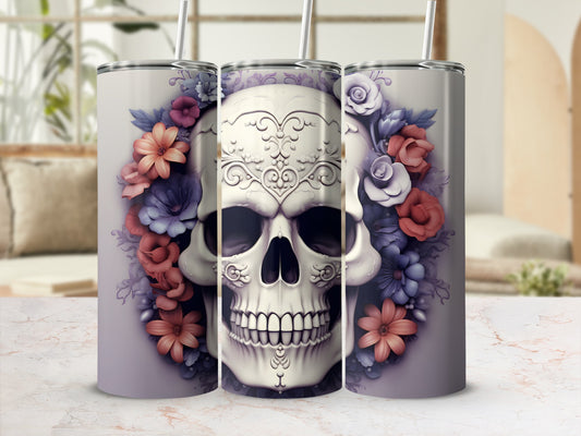 Floral skull tumbler with straws on a marble countertop.