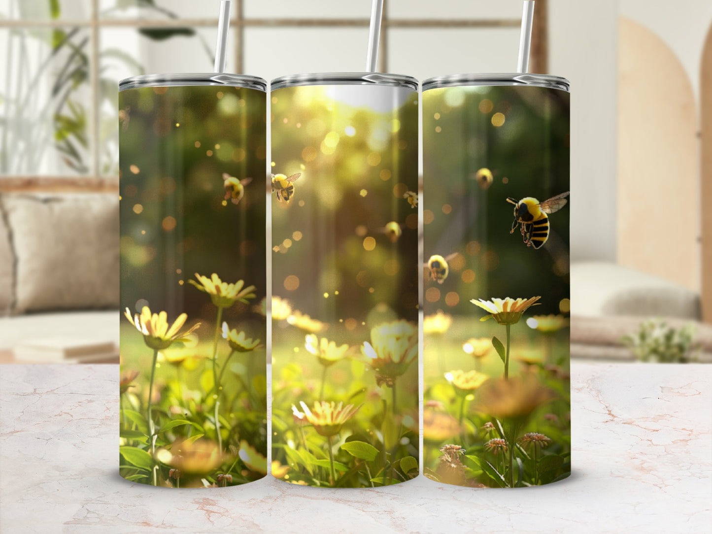 Three tumblers with bees and daisies in sunlight.