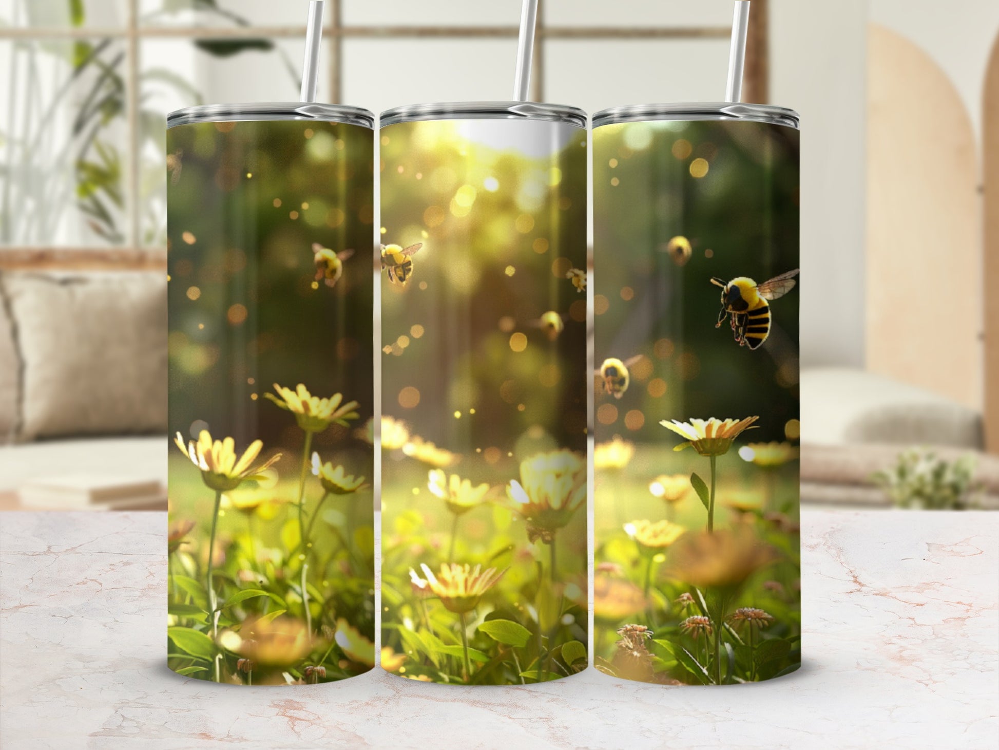 Three tumblers with bees and daisies in sunlight.