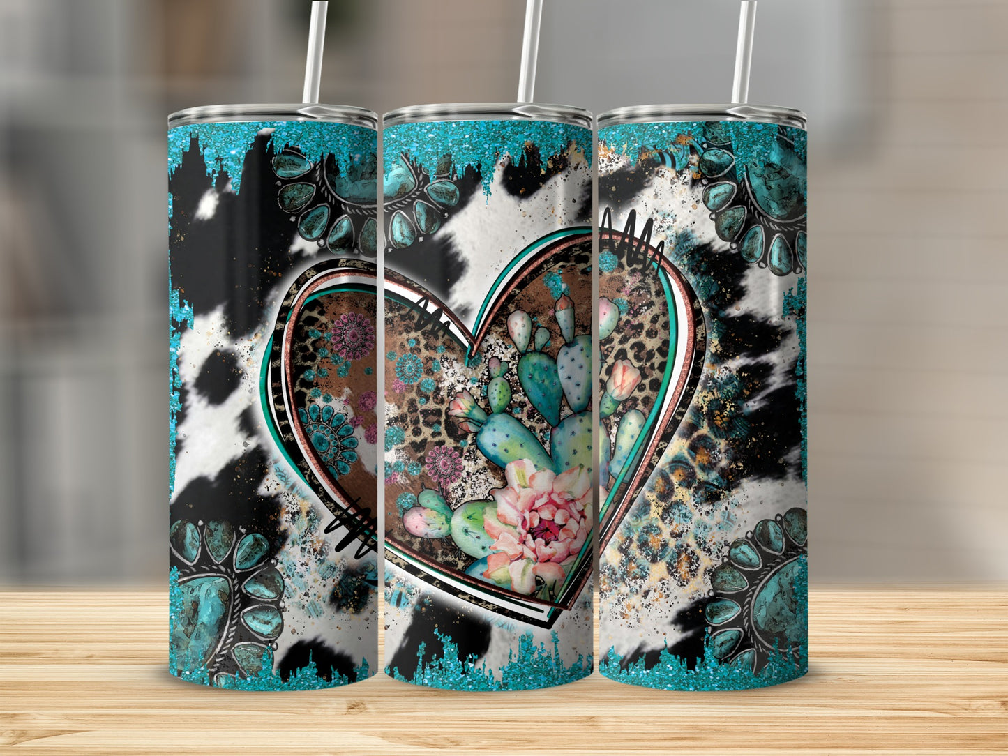 Turquoise and leopard print heart tumbler with cacti and flowers.