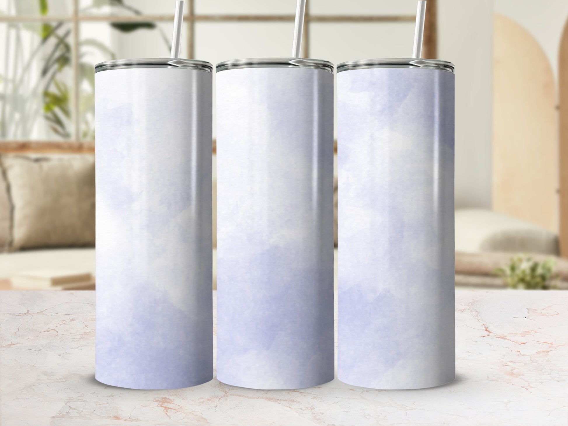 Three tall, white tumblers with a subtle watercolor cloud pattern.