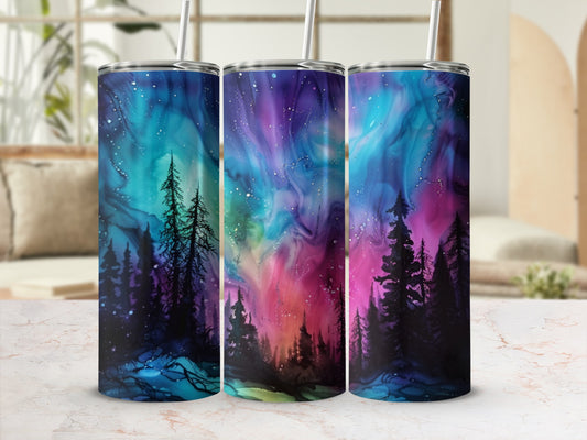 Three tumblers with a starry night sky and silhouetted pine trees.