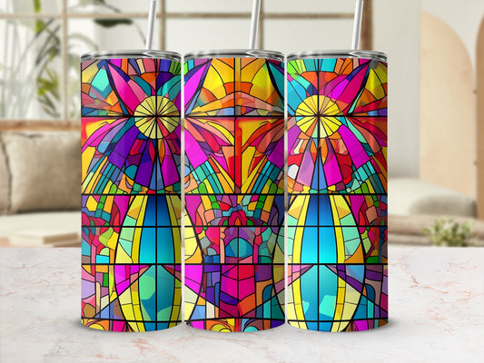 Three stained glass tumblers with colorful geometric patterns and straws.