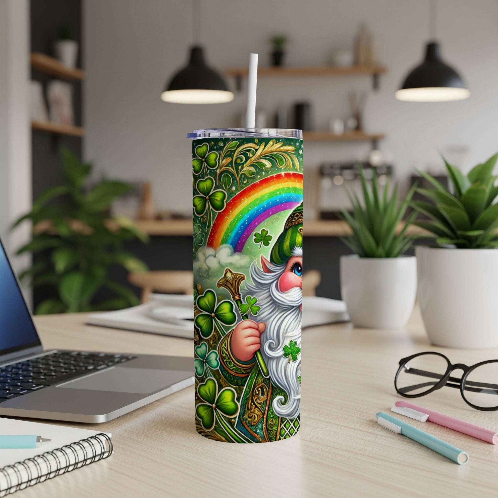 Green leprechaun with shamrocks and rainbow on a St. Patrick's Day tumbler.