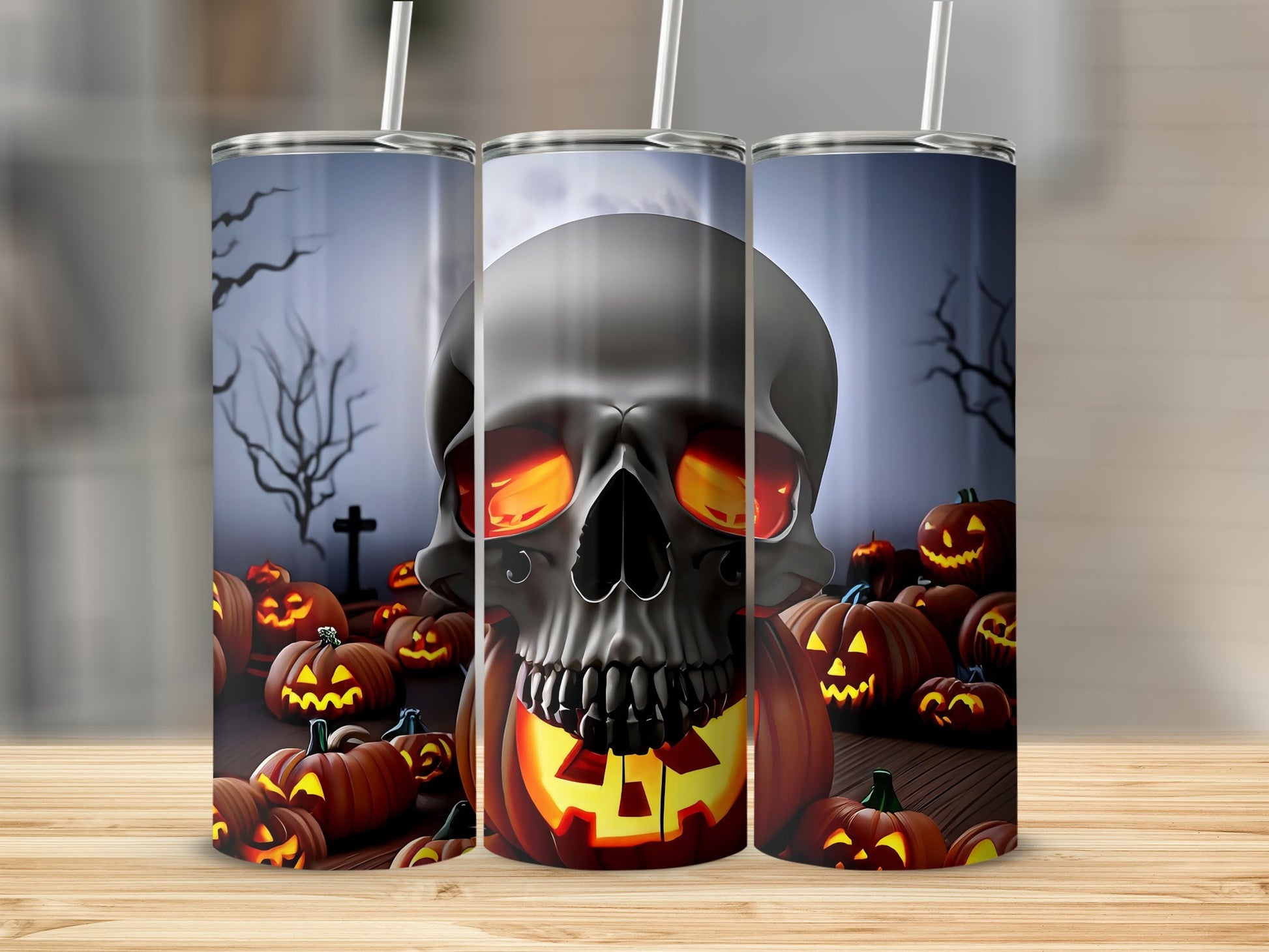 Three tumblers featuring a dark Halloween scene with a skull and pumpkins.