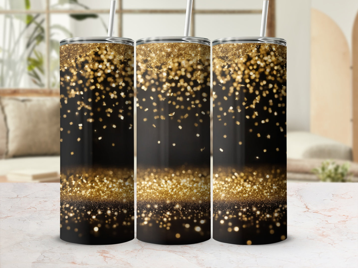 Three black tumblers with gold glitter falling from the top.